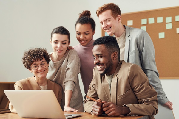 The English Language Coach Happy business people Happy business people The English Language Coach